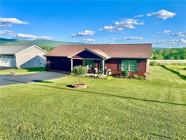 ranch-style home featuring a front yard