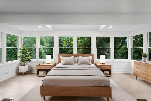 bedroom featuring recessed lighting, light wood-style flooring, and baseboards