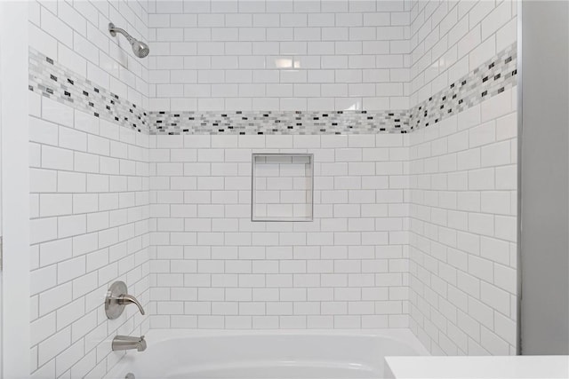 bathroom with shower / bathing tub combination