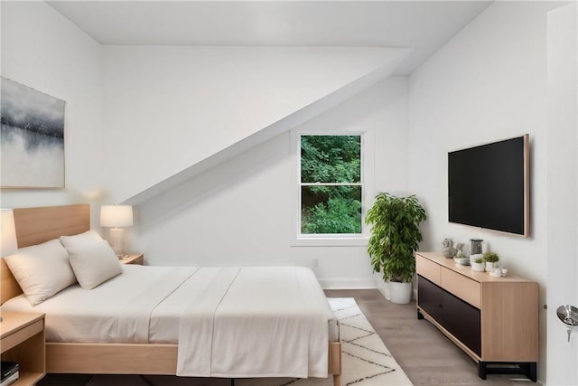 bedroom featuring light wood-type flooring