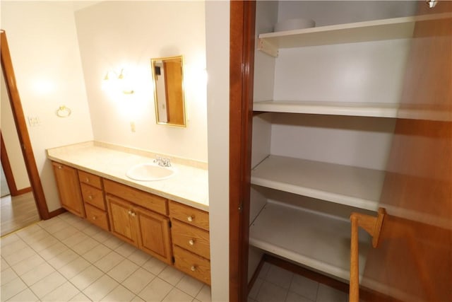 bathroom featuring tile patterned floors and vanity