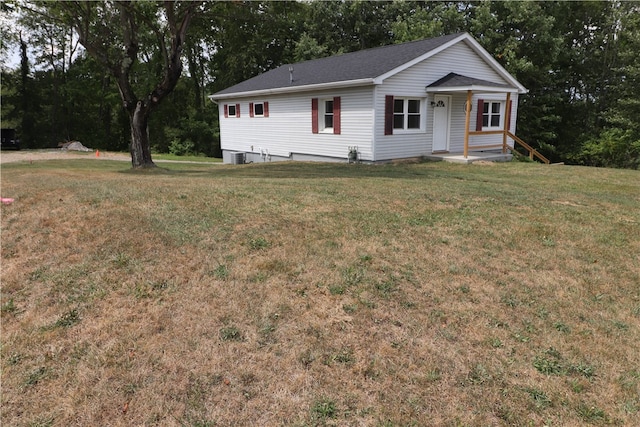 single story home with a front yard