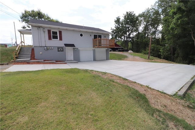 view of front of property with a front lawn, a garage, driveway, a wooden deck, and stairs