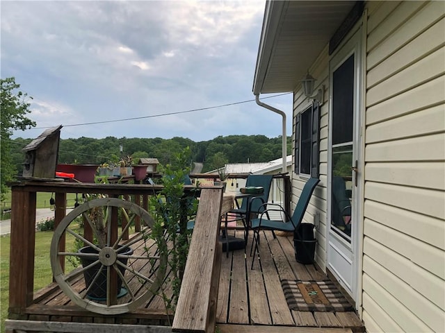 wooden balcony with a wooden deck