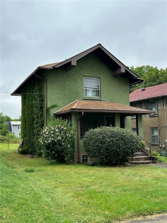 exterior space with a front yard