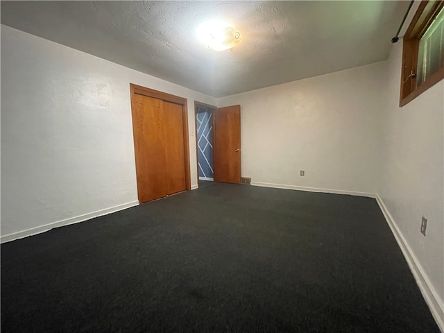 spare room with carpet flooring