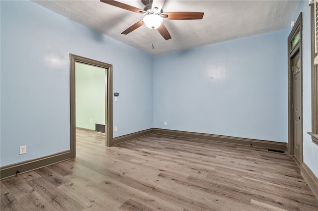 unfurnished room with light hardwood / wood-style floors and ceiling fan