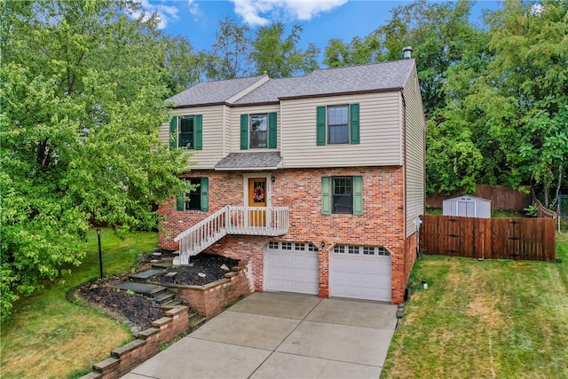 view of front of property featuring a front yard and a garage