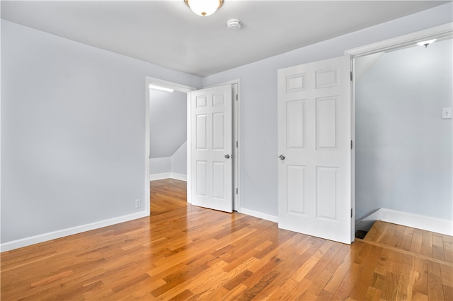 unfurnished bedroom featuring wood-type flooring