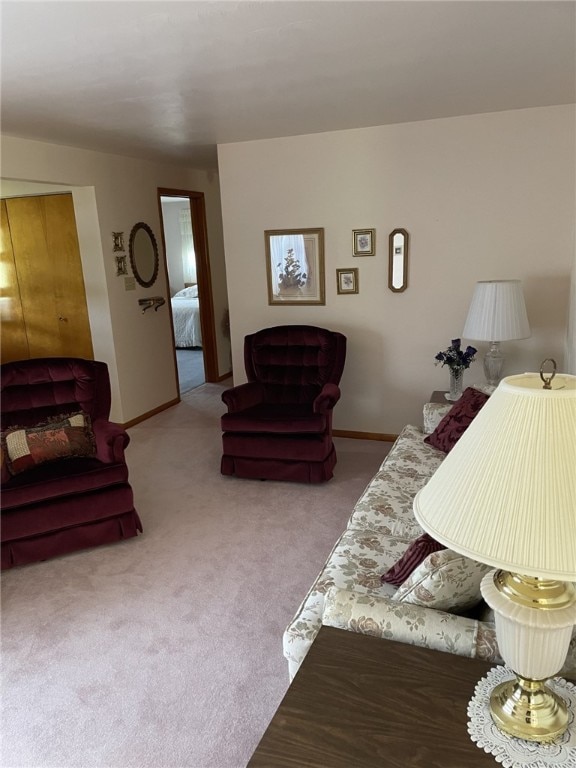 142 Greenridge Dr, Carroll Twp, PA 15063 - carpeted living area featuring baseboards