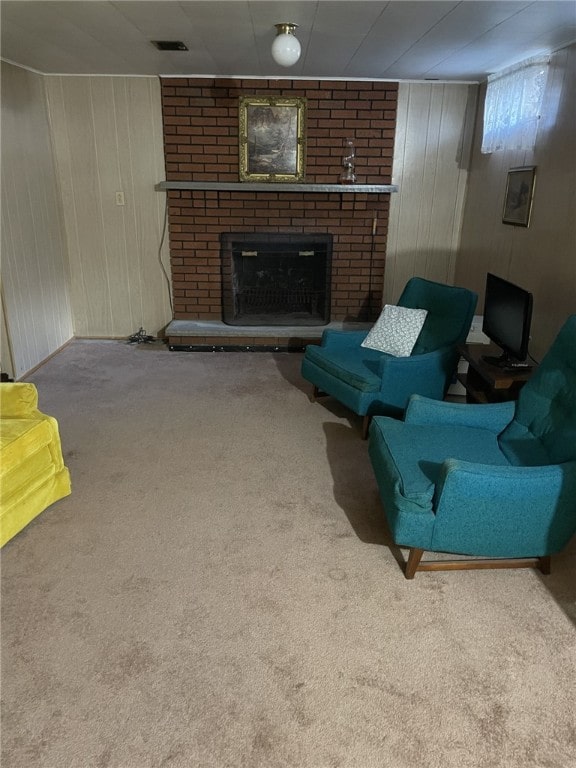 142 Greenridge Dr, Carroll Twp, PA 15063 - carpeted living area with a fireplace and wooden walls