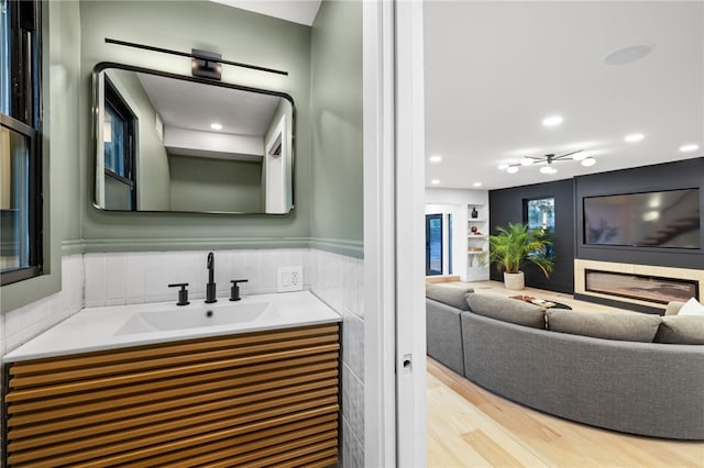 bathroom featuring vanity and wood-type flooring