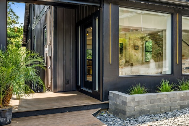 doorway to property with a wooden deck