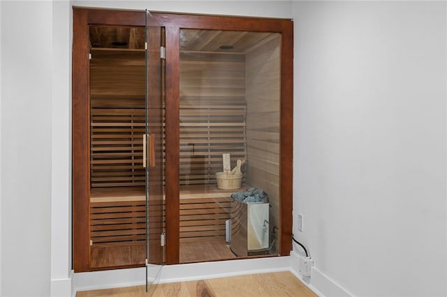 view of sauna / steam room featuring hardwood / wood-style floors