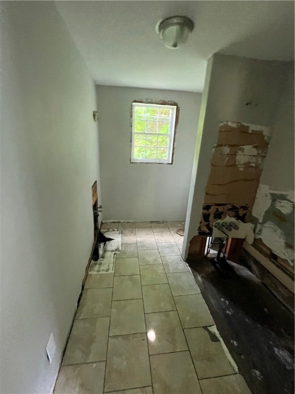 interior space featuring light tile patterned floors