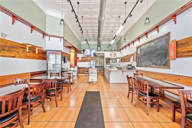 dining area with a high ceiling