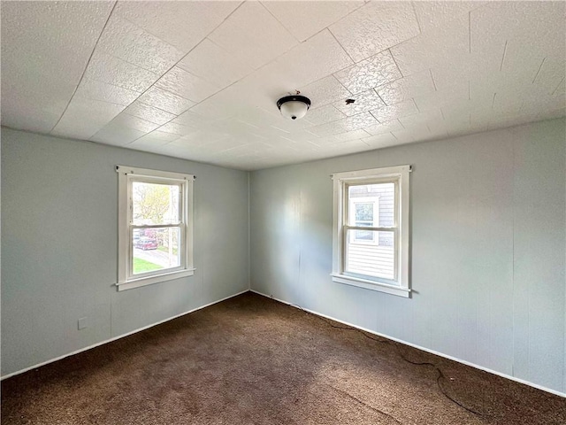 118 Wengler Ave, Sharon, PA 16146 - empty room featuring plenty of natural light and dark carpet