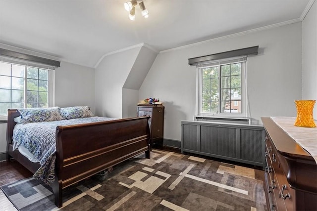 bedroom featuring radiator, baseboards, ornamental molding, and lofted ceiling