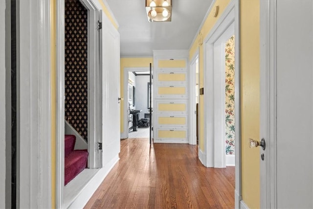 17 Wilmont Ave E, Washington Boro, PA 15301 - hallway featuring wood finished floors, baseboards, ornamental molding, and stairs
