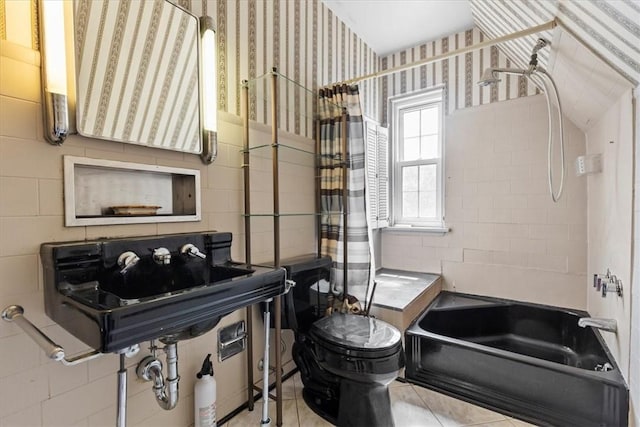 17 Wilmont Ave E, Washington Boro, PA 15301 - full bathroom with wallpapered walls, toilet, tile patterned floors, and bathtub / shower combination