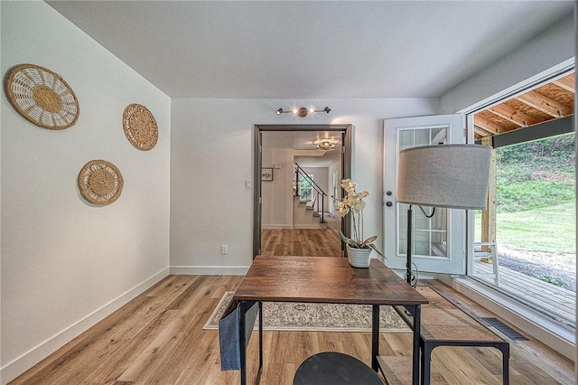 home office featuring plenty of natural light and light wood-type flooring