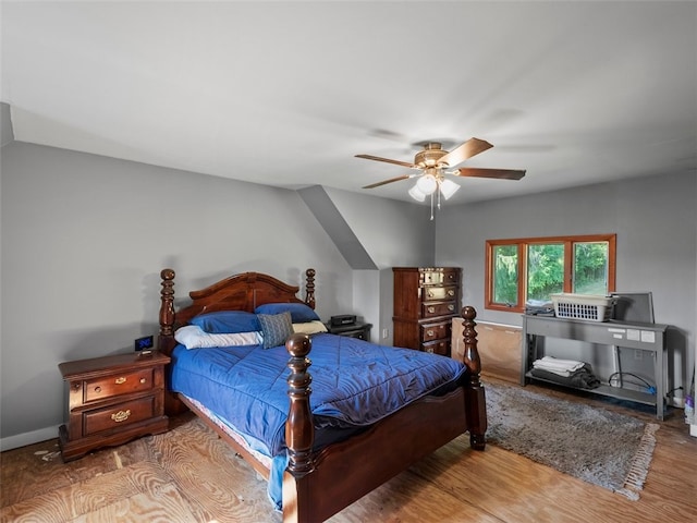 bedroom featuring light hardwood / wood-style floors and ceiling fan