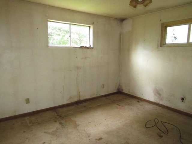 spare room featuring a wealth of natural light