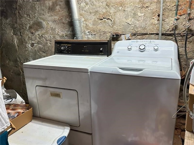 washroom featuring independent washer and dryer