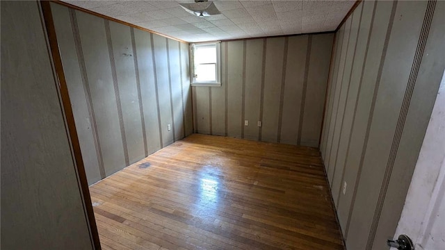 spare room featuring hardwood / wood-style floors