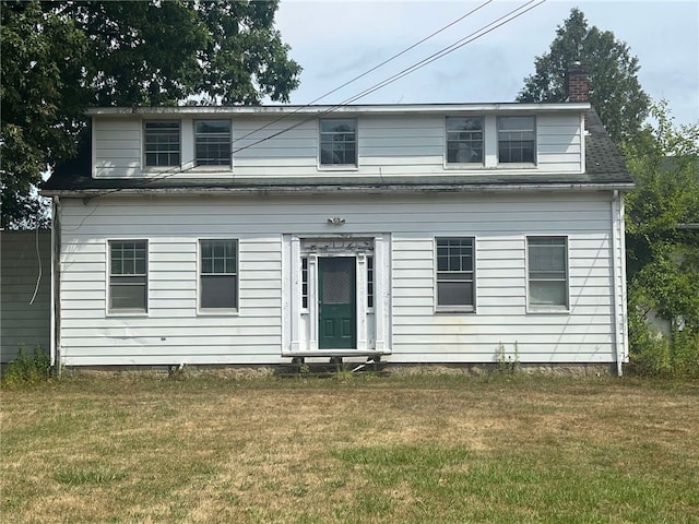 view of front of home featuring a front yard