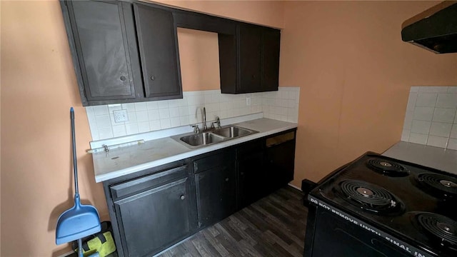 kitchen with black electric range, backsplash, range hood, dark hardwood / wood-style flooring, and sink