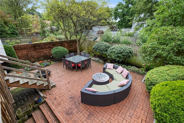 view of patio / terrace with a fire pit