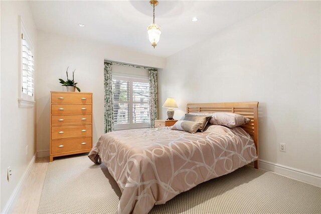 bedroom featuring light hardwood / wood-style flooring