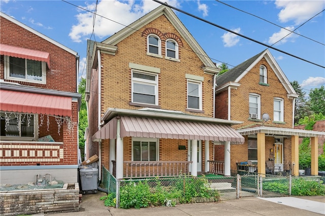 front facade featuring covered porch