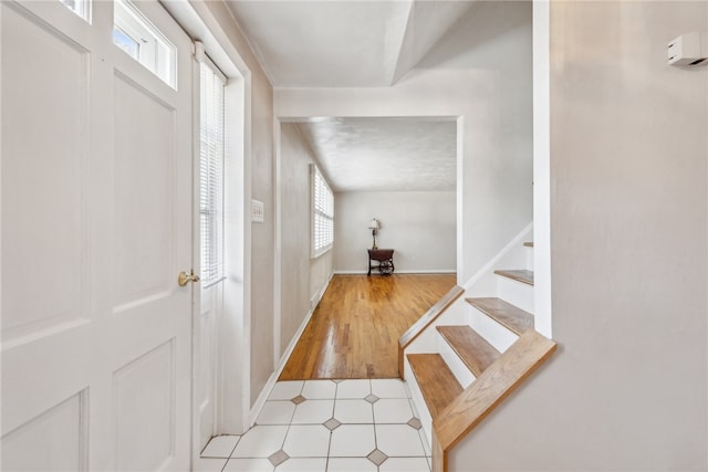 entrance foyer featuring light hardwood / wood-style floors