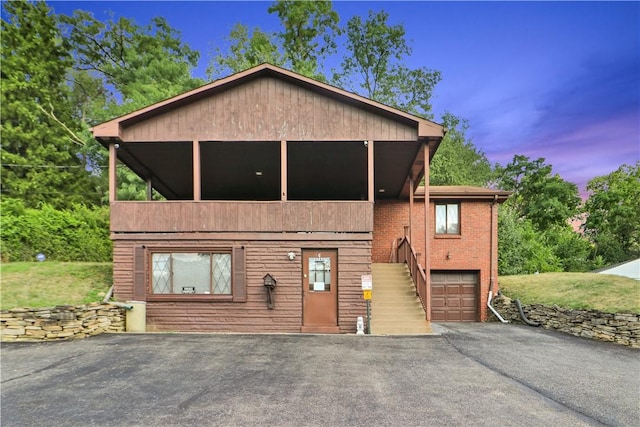 view of front of property with a garage