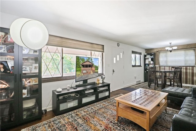 living room with a fireplace and hardwood / wood-style floors