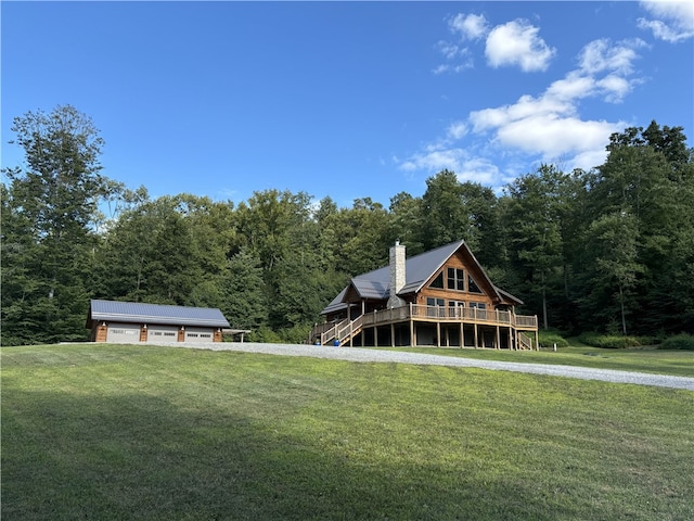 view of front of house with a wooden deck and a front yard