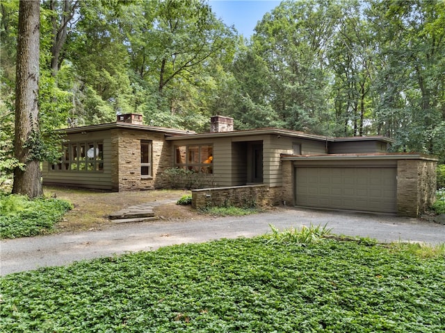 view of front of property featuring a garage