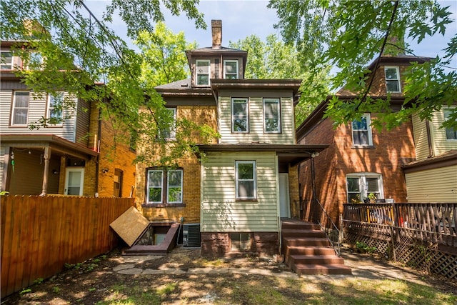 back of property with central air condition unit