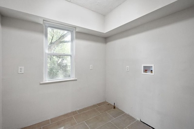 laundry area featuring tile patterned floors and hookup for a washing machine