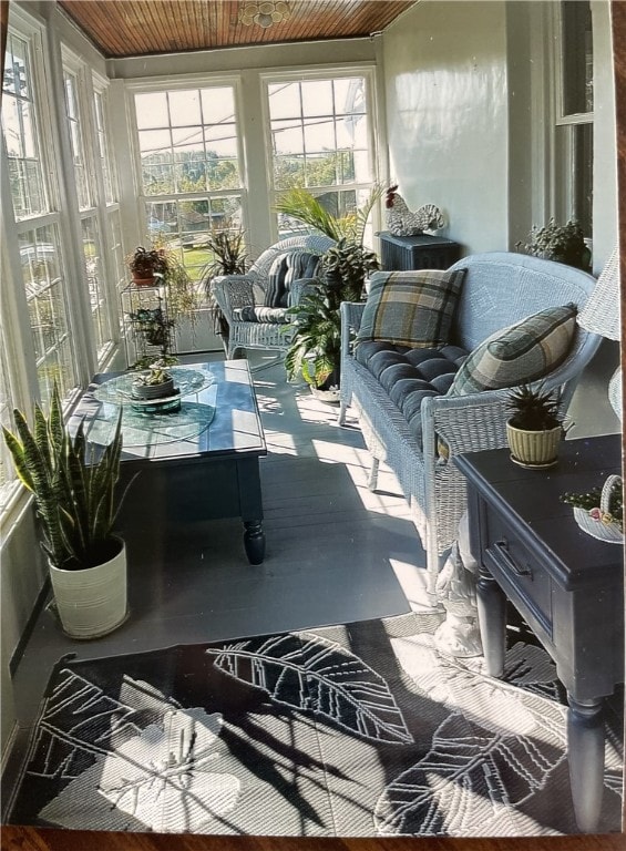 sunroom / solarium featuring wood ceiling