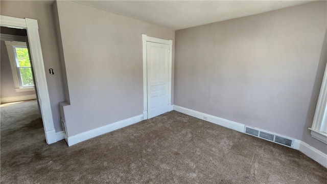 empty room with carpet floors