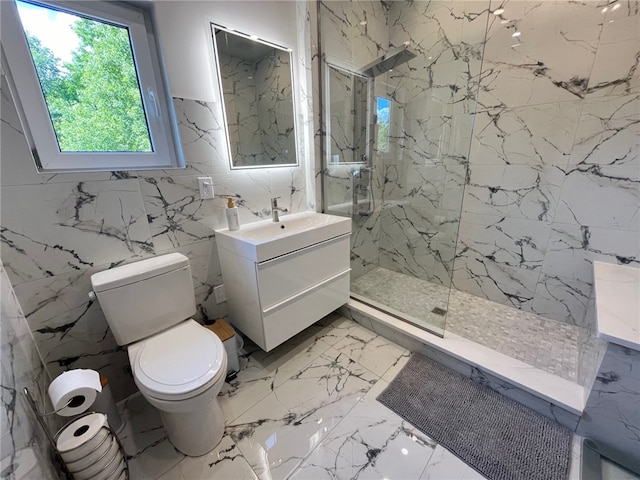 full bath with marble finish floor, a marble finish shower, toilet, vanity, and stone wall