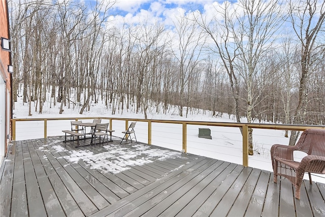 view of snow covered deck