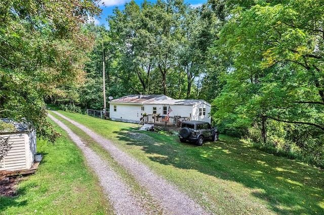 209 Challenge Ln, Indiana Twp Nal, PA 15024 - view of front facade with driveway, a wooden deck, and a front lawn