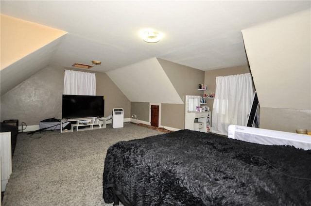 carpeted bedroom featuring vaulted ceiling