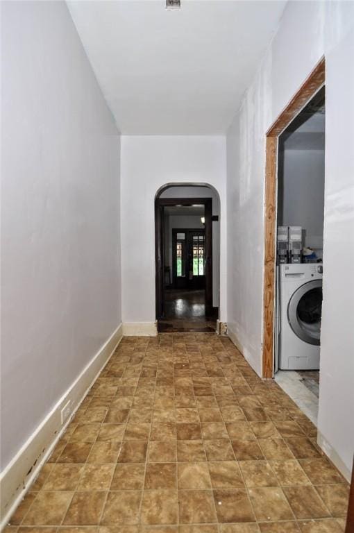 hallway featuring washer / dryer