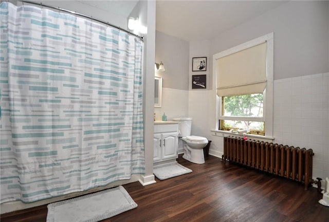 306 Shirls Ave, City Of Washington, PA 15301 - full bathroom with radiator, toilet, wood finished floors, and vanity