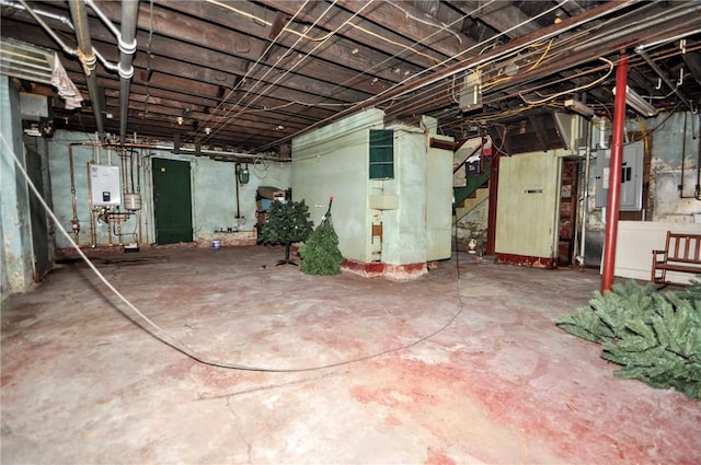 306 Shirls Ave, City Of Washington, PA 15301 - unfinished basement with water heater, electric panel, and stairs